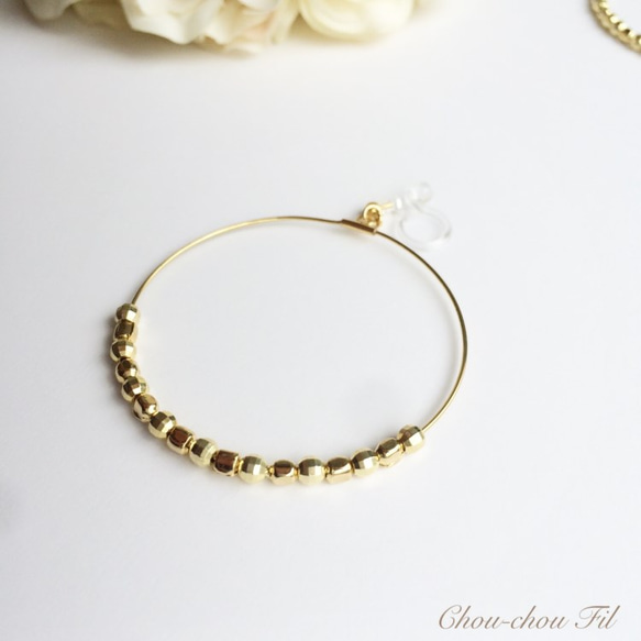 gold beads hoop earring 第2張的照片