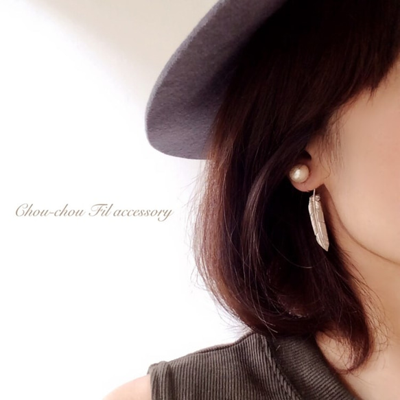 pearl&back feather charm earring 第1張的照片