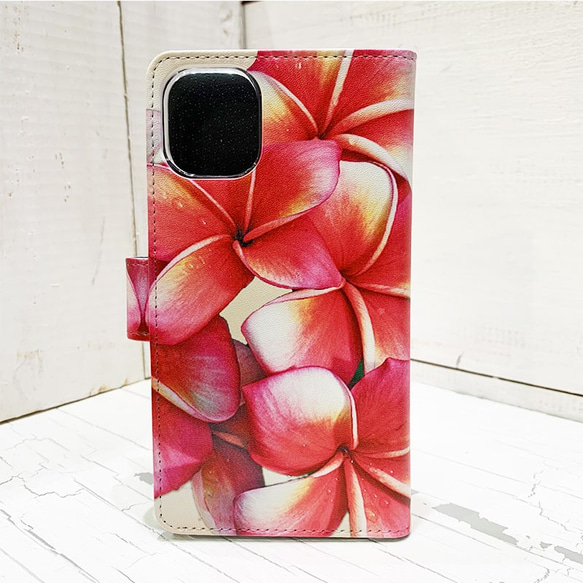 プルメリアの手帳型iphoneケース　ハワイアン柄ブックタイプケース　かわいい赤いお花　カード収納 3枚目の画像