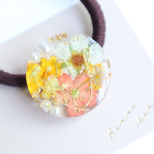 イエローフラワーレジンヘアゴム ポニーフック変更可能。 イエローフラワーレジンヘアゴム ポニーフック変更可能。