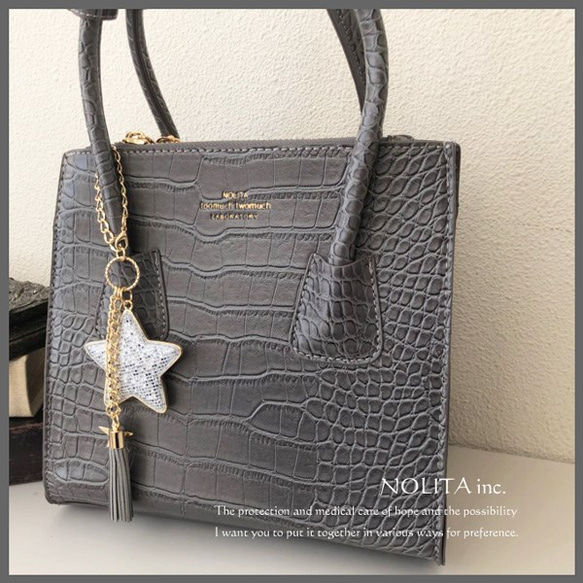 用大星星和流蘇閃光包袋吊飾 a046 G 完美地佈置您的包包 第5張的照片