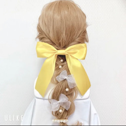 おっきなリボンとパールのヘアアクセサリー(イエロー) 1枚目の画像