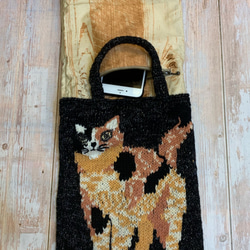 #knitting bag 手工棒針編織手提袋。貓咪手提袋。顏色~黑/橘/白。包包微微帶金蔥。 第4張的照片