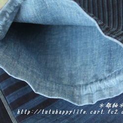 松阪木綿本藍染 縞無地切り返し巾着袋（大）ろうびき紐使用　パッチワーク仕立て　長財布がストンと入ります。 2枚目の画像