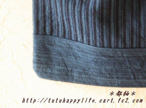 松阪木綿本藍染 縞無地切り返し巾着袋（大）ろうびき紐使用　パッチワーク仕立て　長財布がストンと入ります。 3枚目の画像