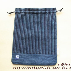 松阪木綿本藍染 縞無地切り返し巾着袋（大）ろうびき紐使用　パッチワーク仕立て　長財布がストンと入ります。 5枚目の画像