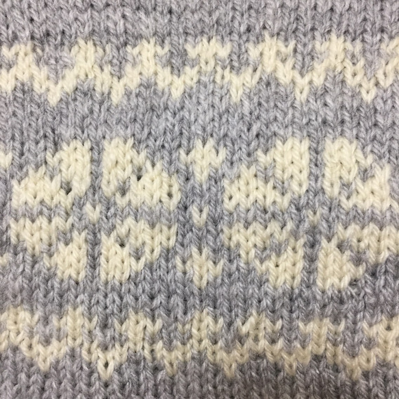 北欧ノルディック柄(雪の結晶)の手編みクラッチバッグ 3枚目の画像