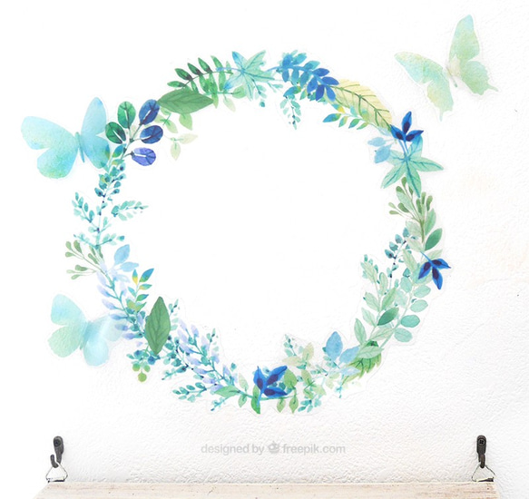 花リースとウォールデコ蝶々