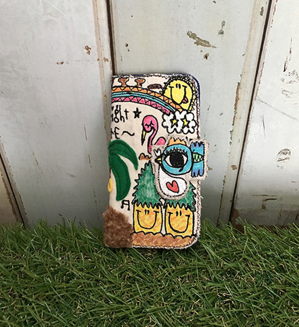 【受注生産】ハワイアンコウノトリ刺繍スマホケース（iPhone6/6s,7/8/SE2,X,XS用） 1枚目の画像