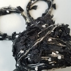④A751｢ブラックフラワースパンコール」引き揃え糸　素材糸 1枚目の画像