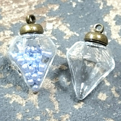 ダイヤモンド型  ガラスドーム  ゴールドのキャップつき 2枚目の画像