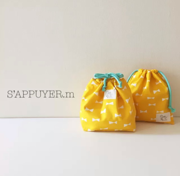 リボン柄 お弁当袋&コップ袋セット 黄色とミント 1枚目の画像