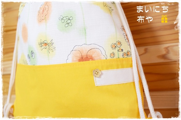 ナップサック型：爽やかな花柄の着替え袋(体操着袋）：橙色 2枚目の画像