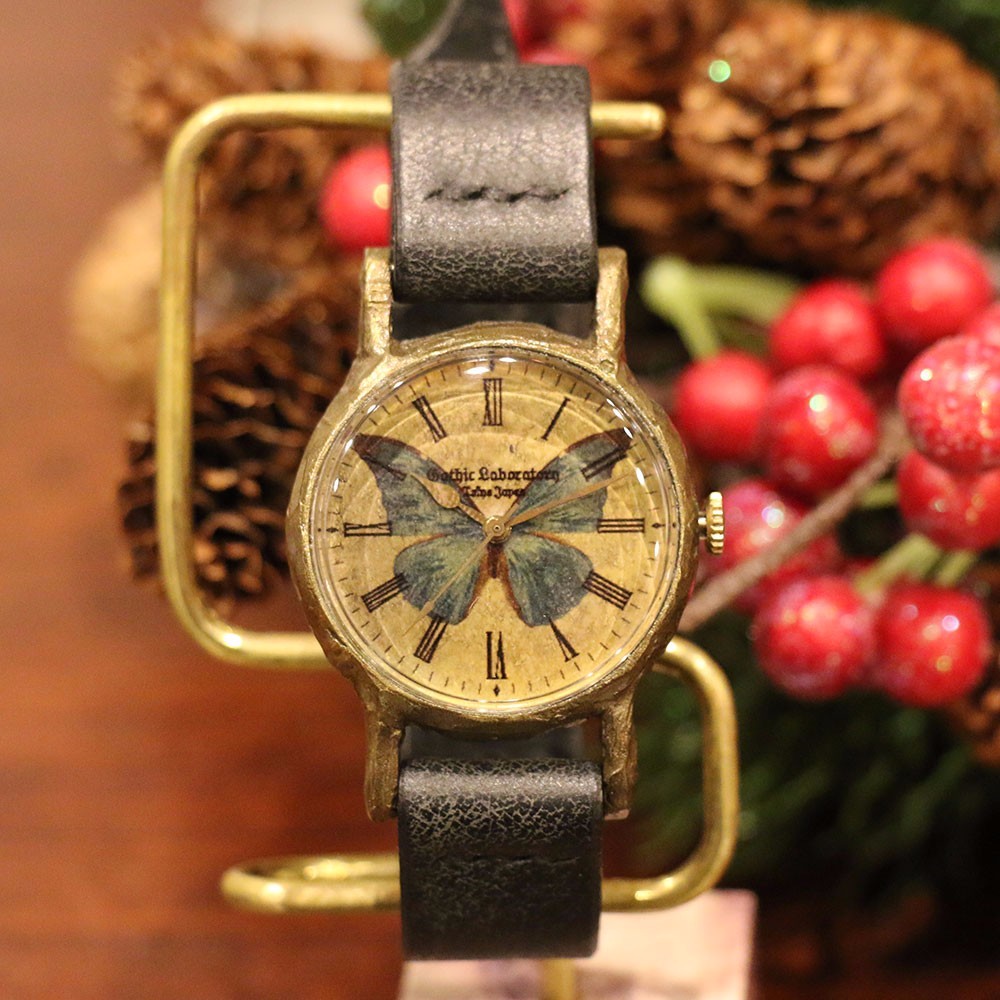 モルフォ蝶のクォーツ手巻き腕時計 世界に1つだけ。ベルト(ダークブラウン)金具金 世界一美しい蝶 モルフォ蝶の腕時計 Mサイズ 腕時計 ヤナイコウヘイ（A