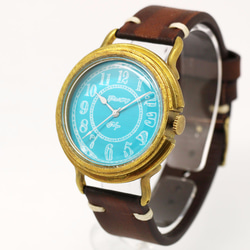 GENSO コバルトターコイズの腕時計 アラビア数字文字盤 青い文字盤に白い針 3枚目の画像