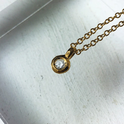 ダイヤモンドのペンダントネックレス 槌目ペンダント 3mm 4月 誕生石 首飾り SV K18GP 4枚目の画像