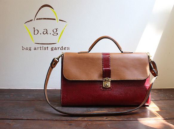 アルマジロ革仕様のできる女のカチッとバッグ ショルダーバッグ かばん
