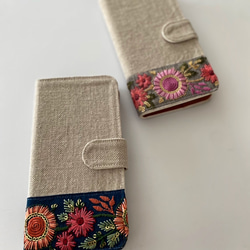 手帳型　刺繍リボン iPhoneケース 1枚目の画像