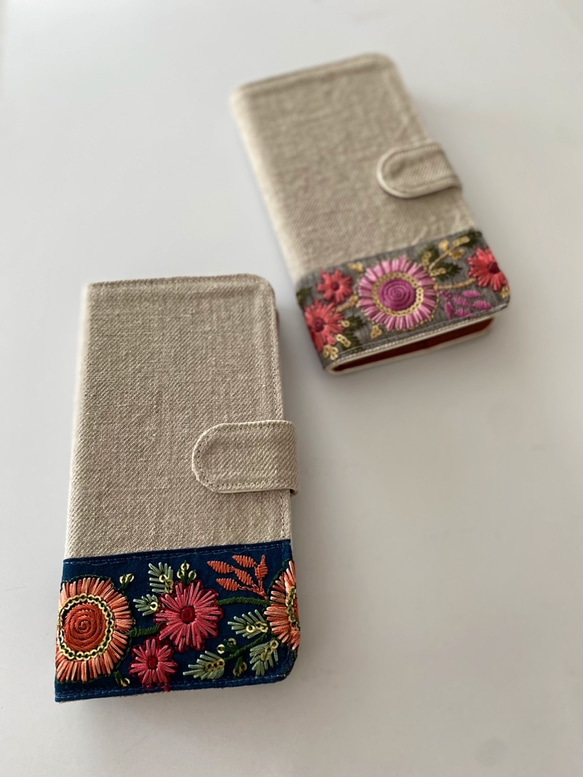 手帳型　刺繍リボン iPhoneケース 1枚目の画像