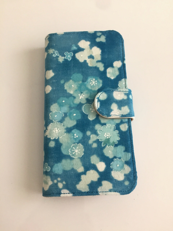 筆記本型小花浮海iPhone手機殼 第2張的照片