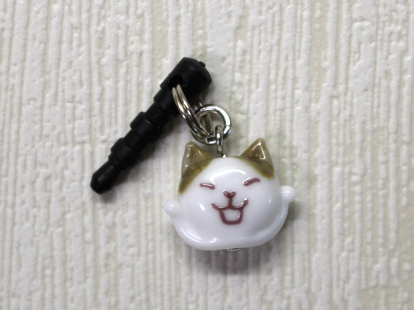 ガオー猫のイヤホンジャック　白×キジトラ　ガラス 1枚目の画像