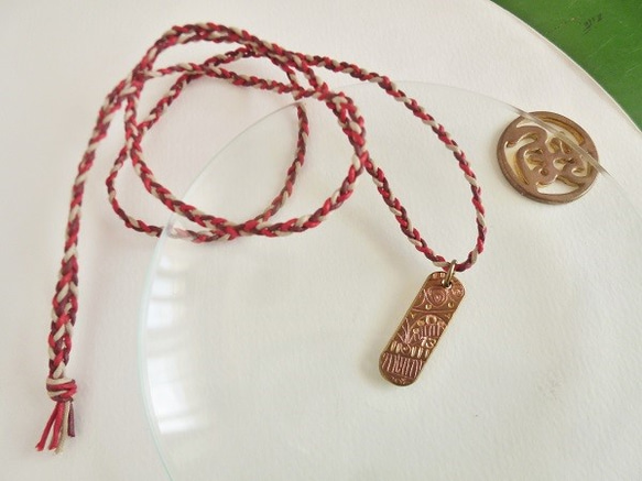 ムイム柄の赤紐ペンダント ネックレス・ペンダント Tsubasa KATOU 通販