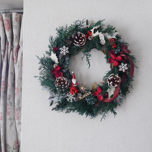 サンタとスノーマンからクリスマスリースのプレゼント