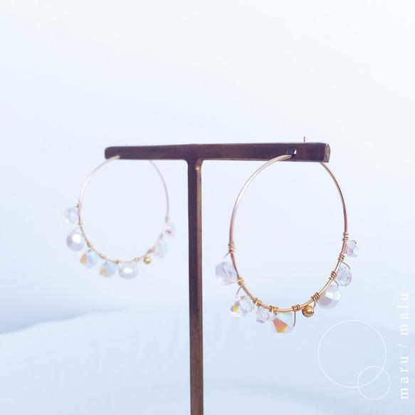 :the path of the wind: 14kgf hoop earrings transparent beads 第3張的照片