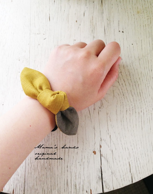 主推商品⭐️非常受歡迎，已售出284件《亞麻雙色》卡其色 x 芥末黃絲帶髮圈 第3張的照片