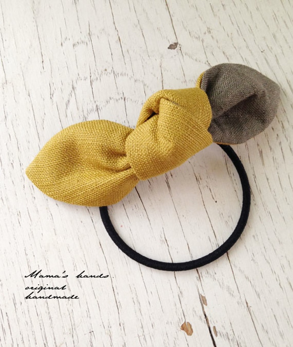 主推商品⭐️非常受歡迎，已售出284件《亞麻雙色》卡其色 x 芥末黃絲帶髮圈 第1張的照片