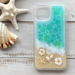 水綠色海洋和雞蛋花混合保護殼，適合各種 iPhone 尺寸 第2張的照片