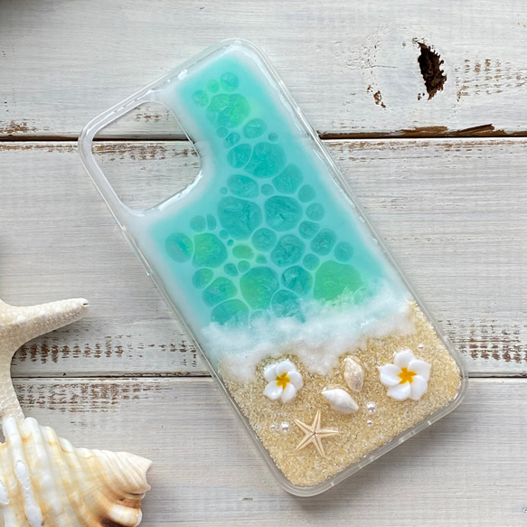 水綠色海洋和雞蛋花混合保護殼，適合各種 iPhone 尺寸 第3張的照片