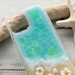 水綠色海洋和雞蛋花混合保護殼，適合各種 iPhone 尺寸 第4張的照片