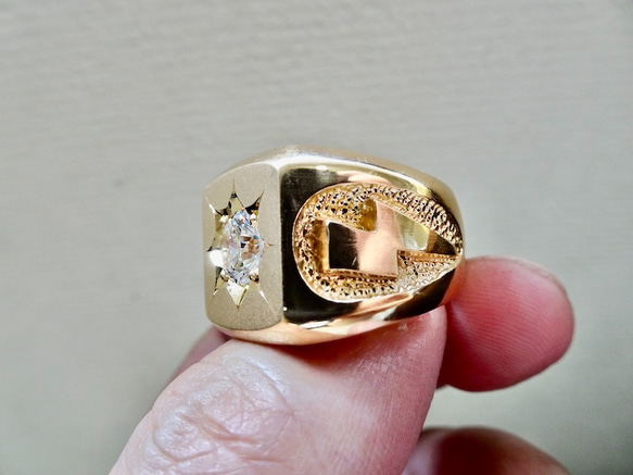 見事な創造力 仁尾彫金『一つ星ジルコニアゴールドサンダー印台リング 21号～