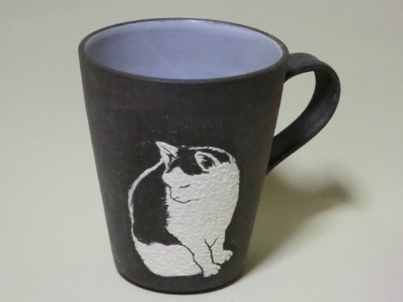 ブチ猫のマグカップ 1枚目の画像