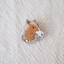 うまブローチ 1枚目の画像