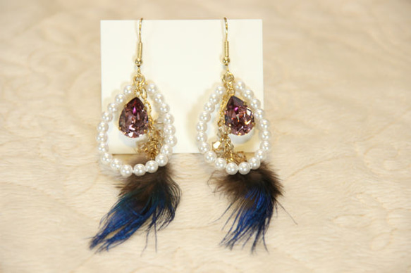 SWAROVSKI & feather pierce 1枚目の画像