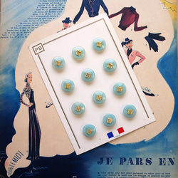 ヴィンテージ　フランスのボタン　エメラルド　18mm 2個セット 1枚目の画像
