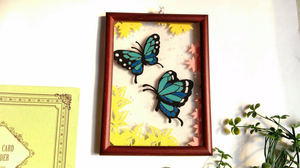 藍色蝴蝶2L大小牆壁垂懸的框架 第1張的照片