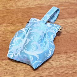 水色ジャガード生の消毒スプレーや除菌スプレーをかばんやベルトに付ける事ができるボトルケース(真空スプレーボトル付き) 2枚目の画像