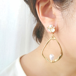 垂墜珍珠和珠寶耳環/耳環 第1張的照片