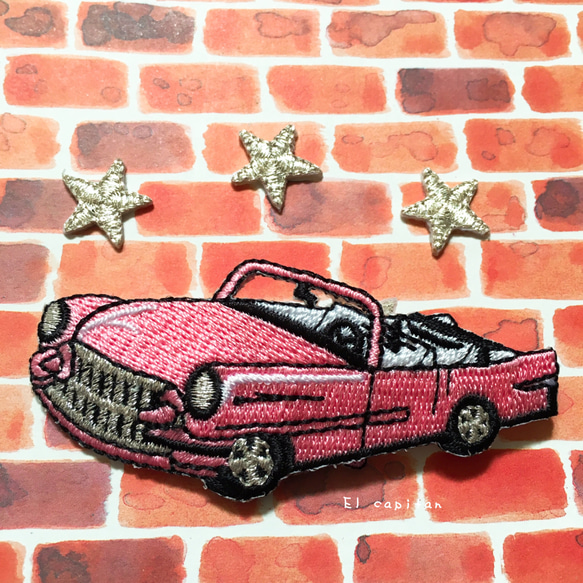 ピンクのスポーツカーとシルバーの星 3枚目の画像