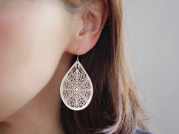 14公斤東方水滴耳環/耳墜，鏤空花紋 第5張的照片