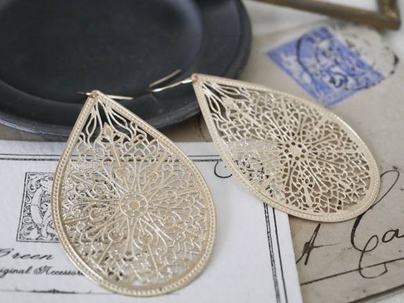 14公斤東方水滴耳環/耳墜，鏤空花紋 第6張的照片