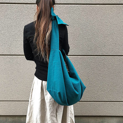 ■7天內出貨■【4月12日重新販售】四合一！容量超大的圓形包包，滿足你所有需求。亞麻肩包、斜背包，春季必備。 第4張的照片