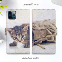 iPhone15/iPhone15 Pro/送料無料 全機種対応☆手帳型スマホケース・カバー ブーツの中の子猫 猫 1枚目の画像