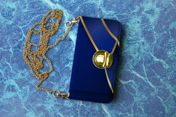 免費送貨 兼容所有型號 ☆ 筆記本型智能手機保護套/保護套 插入式鎖型 金色和寶藍色 鏈帶 第1張的照片
