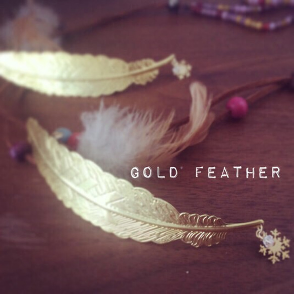 gold feather 羽のバレッタ 1枚目の画像