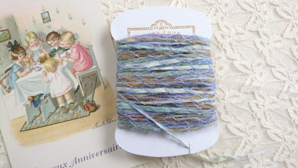 ちょこっと毛糸♪シルバーのラメ糸がアクセントになった、色合い綺麗なふわっと毛糸　～水色×キミドリ系～ 1枚目の画像