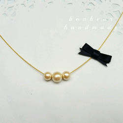 ribbon cottonpearl necklace 1枚目の画像